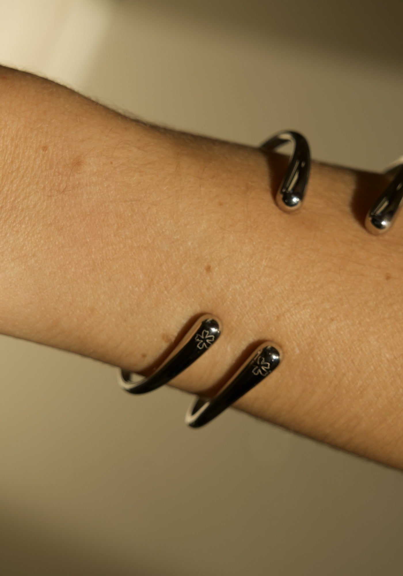 Minimal Bracelet in silver worn on the forearm