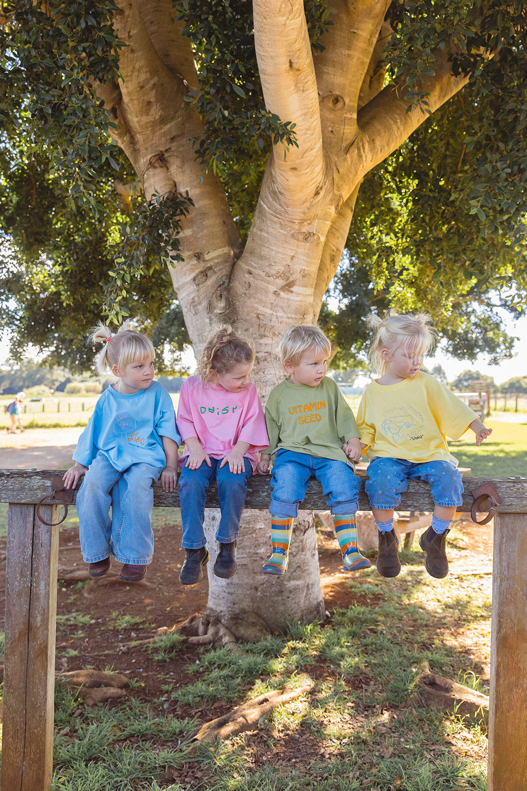 Family wearing embroidered Momenta tees